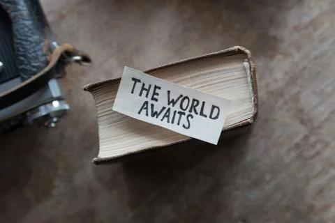 Text The World Awaits Stock Photos