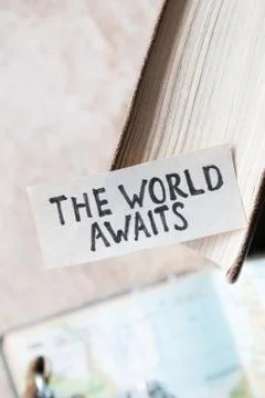 Text The World Awaits Stock Photos