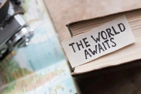 Text The World Awaits Stock Photos