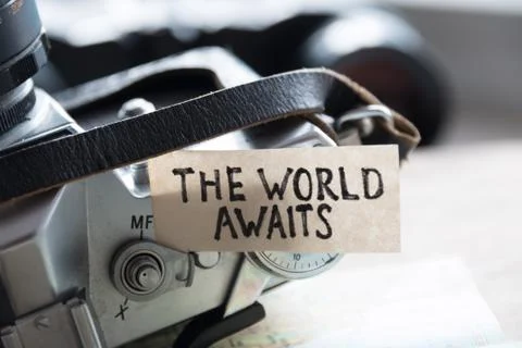 Text The World Awaits Stock Photos