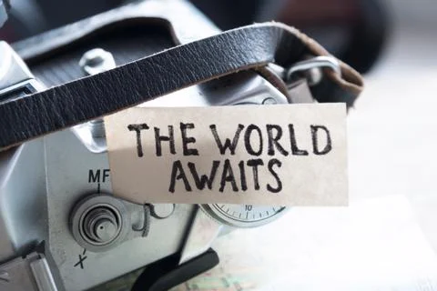 Text The World Awaits Stock Photos