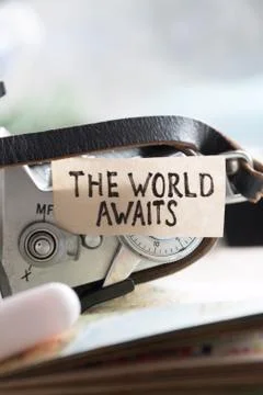 Text The World Awaits Stock Photos