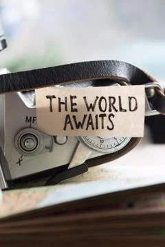 Text The World Awaits Stock Photos