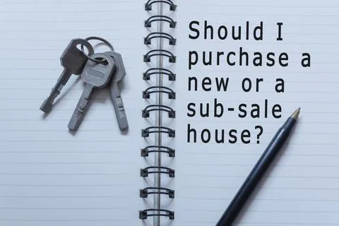 Text written on notebook with house keys and pen. Home buyer concept Stock Photos