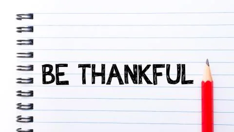 Text written on notebook page Be Thankful  Stock Photos