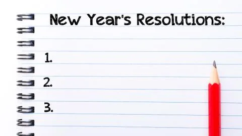 Text written on notebook page New Year resolutions Stock Photos