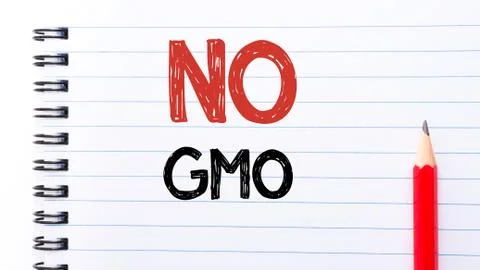 Text written on notebook page NO GMO Stock Photos
