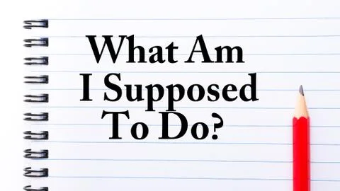 Text written on notebook page What Am I Supposed to Do  Stock Photos