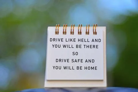 Text Written On A Notepad With Blurred Green Background. Road Traffic Concept Stock Photos