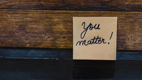 Text You matter on post it. Writing on sticky note. Copy space. Bucharest, .. Stock Photos