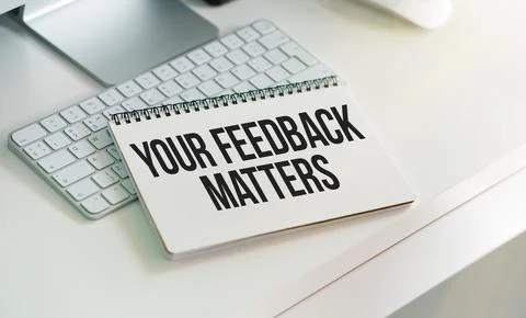 Text your feedback matters on white paper background business concept. Stock Photos