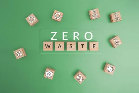 Text ZERO WASTE and icon of sustainability or environmental protection on woo Stock Photos