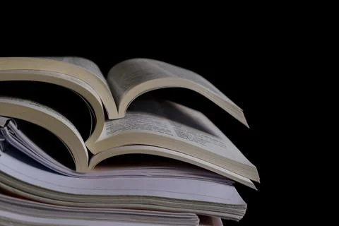 The textbooks opened on top Stock Photos