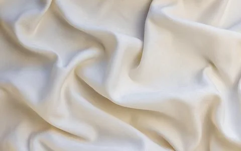 Textile and texture concept - close-up of crumpled fabric background. View from Stock Photos