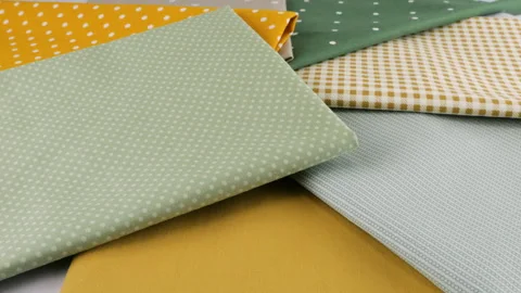Textile background on the design theme, craft, handmade, patchwork, creativity  Stock Footage 293889724