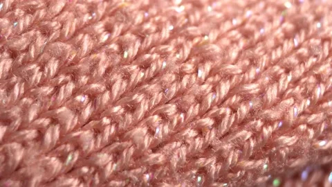 Textile background - fabric made of wool and synthetics for a pink sweater Stock Footage 152535912