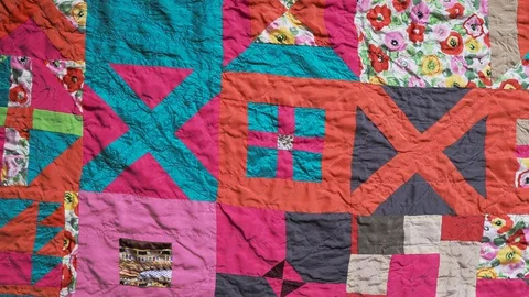 Textile background - panoraming of surface of stitched crumpled patchwork sca Stock Footage 129305237