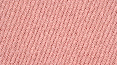 Textile background - pink nylon elastane fabric with jersey ribbing structure Stock Footage 124952531