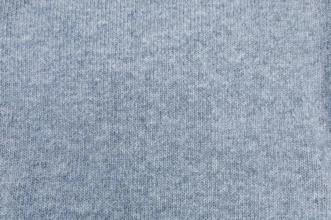Textile background soft cashmere texture. Wool products. Stock Photos