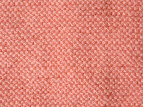 Textile background, texture of knitted clothes for text Stock Photos