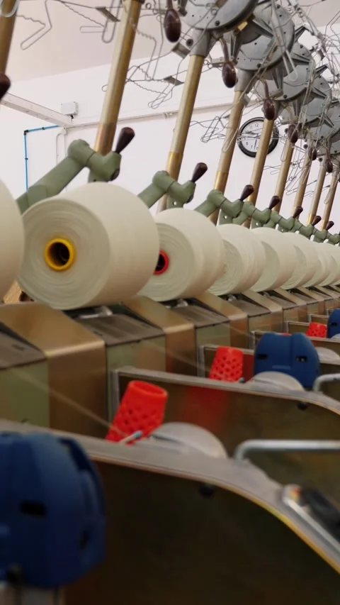Textile factory. Yarn making processes. Threads production. Spinning production. Stock Footage 317703937