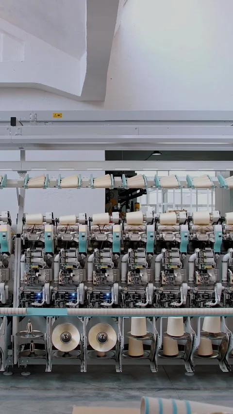 Textile factory. Yarn making processes. Threads production. Spinning production. Stock Footage 318726575