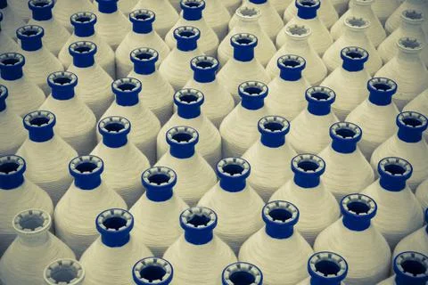 Textile Industry - Empty Spools Stack Stock Photos