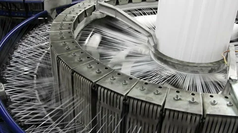Textile industry - yarn spools on spinning machine in a factory Stock Footage 100243621