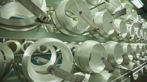 Textile industry - yarn spools on spinning machine in a textile factory Video stock 149330280