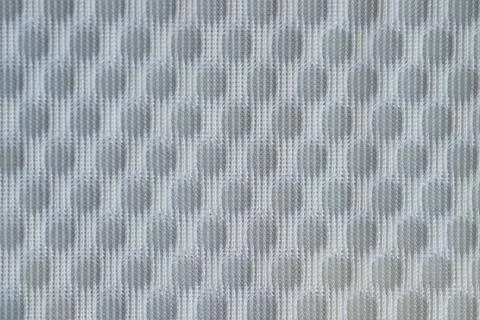 Textile With Intricate Pattern Showcasing Circular Designs in Muted Gray an.. Stock Photos