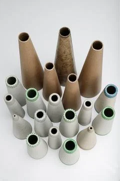Textile paper cones group in different sizes on White background top angle Stock Photos