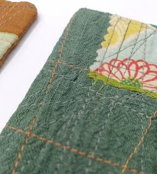 Textile patchwork coaster handmade detail Stock Photos