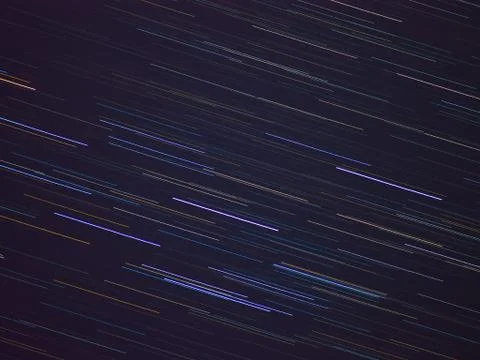 Textile pattern of star trails in the night sky Stock Photos