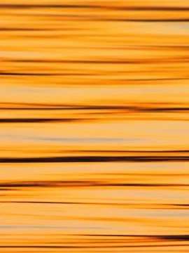 Textile pattern of surface of sunset lake Stock Photos
