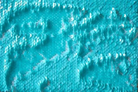 Textile surface with blue round glitter Stock Photos