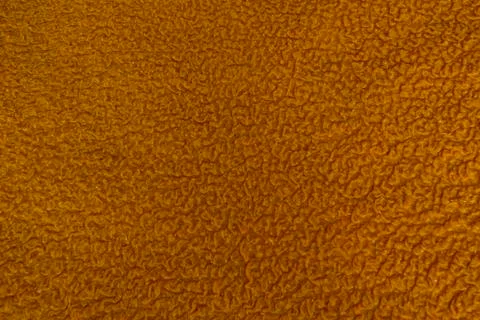 Textile texture. Orange textile. Textile background. Stock Photos