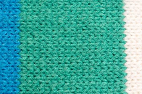Textile texture of wool. Green, white, blue. Stock Photos