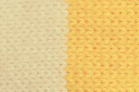 Textile texture of wool is yellow and white in color. Stock Photos