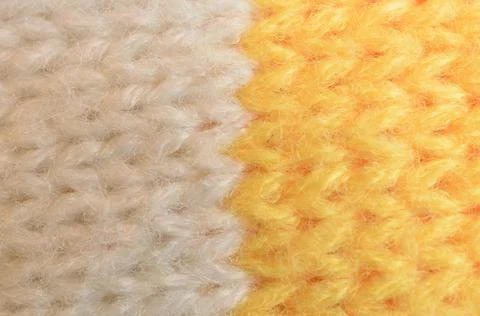 Textile texture of wool is yellow and white in color. Stock Photos