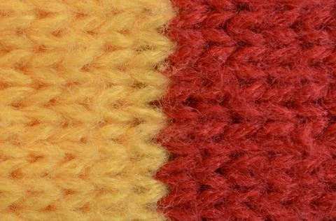 Textile texture of wool yellow and red colors. Stock Photos