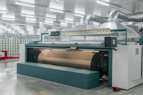 Textile yarn processing shop machine evaporates textile yarn. machinery an... Stock Photos