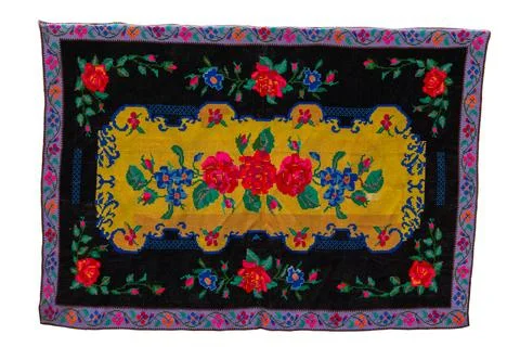 Textiles of Slavic national patterns showcase vibrant flowers in red and blue Photos