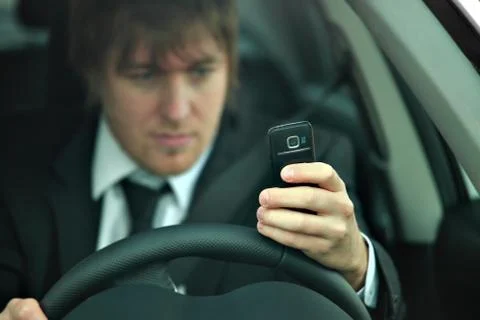Texting and driving Stock Photos