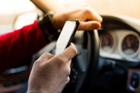 Texting and driving Stock Photos