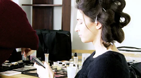 Texting is my addiction while I work as female model Stock Footage 36571741