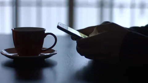Texting on a Smart Phone in Moody Dim Lighting. Video stock 84578859