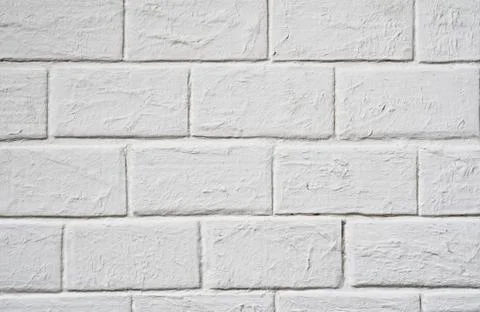 Textural background: white brick wall close up Stock Photos