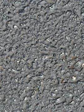 Textural image of a surface coated in asphalt Stock Photos