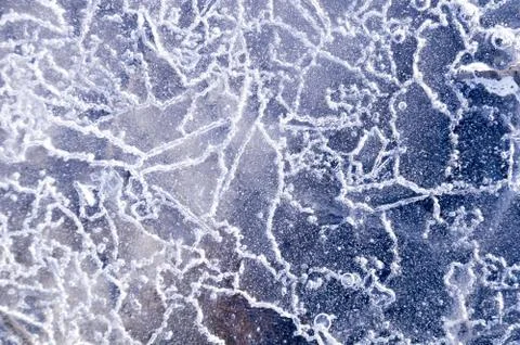 Texture abstract closeup background ice with grooves, furrows, and bubbles of Stock Photos