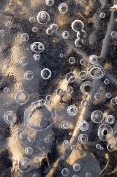 Texture abstract closeup background ice with grooves, furrows, and bubbles of Foto stock